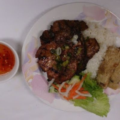 64. Rice With Grilled Pork Chop & Egg Rolls